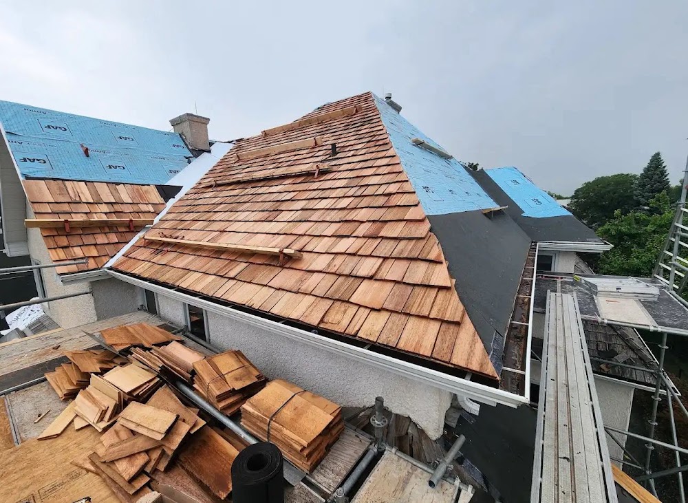 Rogers roofing & construction